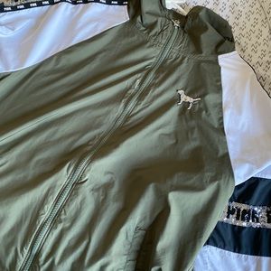 Olive green vs pink windbreaker